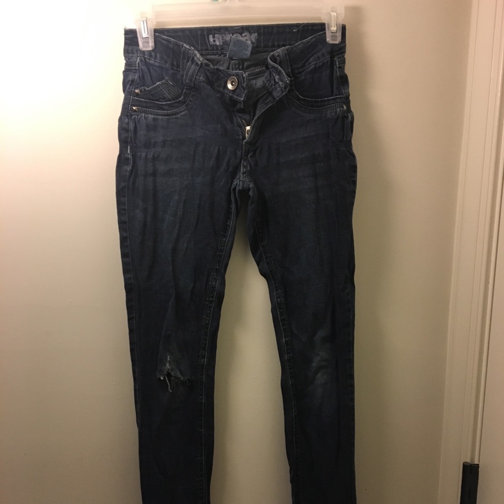 Blue distressed skinny jeans
